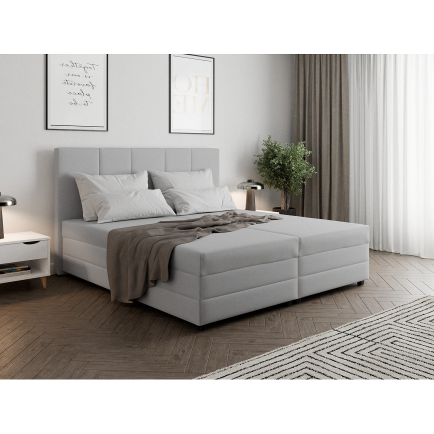 Čalouněná postel s pružinovou matrací a úložným prostorem ISABEL 160x200 světle šedá