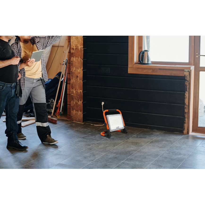 LED Reflektor se stojanem LED/100W/230V 4500K IP65 oranžová