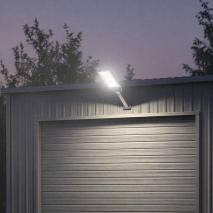 LED Stmívatelná solární pouliční lampa se senzorem VENICE LED/100W/3,2V 6000 mAh IP65 černá + dálkové ovládání