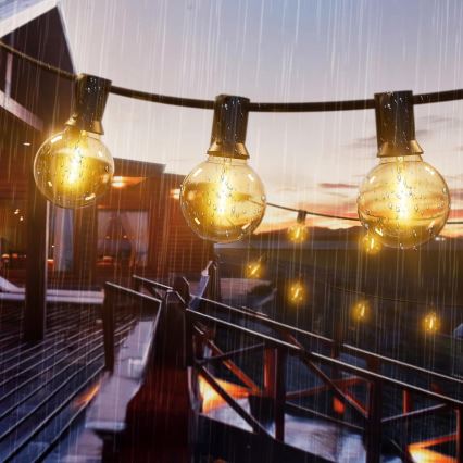 LED Stmívatelný venkovní dekorační řetěz 25xE12/1W/24/230V 17,5 m IP65 černá + dálkové ovládání