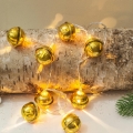 LED Vánoční řetěz 10xLED/2xAA/teplá bílá 1,8m rolničky
