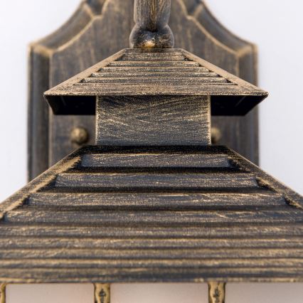 Venkovní nástěnná lampa KIKO 1xE27/11W/230V IP44 bronz/patina