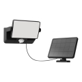 Philips - LED Solární nástěnný reflektor se senzorem FYNS LED/8,2W/3,7V 2600 mAh 3000K IP44 černá