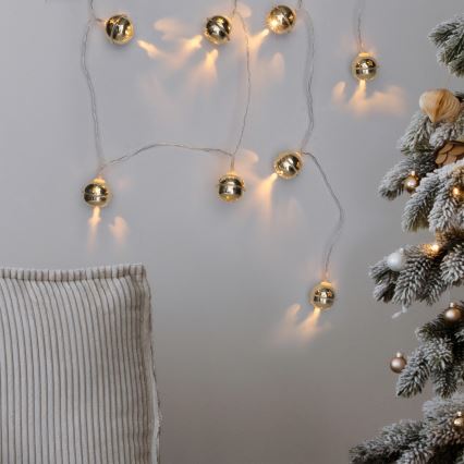 LED Vánoční řetěz 10xLED/2xAA/teplá bílá 1,8m rolničky