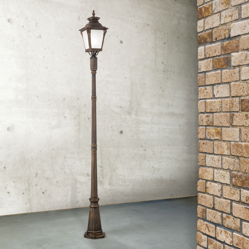 Venkovní lampa AIKO 1xE27/60W/230V 240 cm IP23 bronz/patina