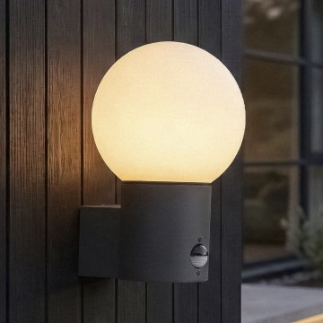 Venkovní nástěnná lampa se senzorem pohybu a soumraku STONO 1xE27/15W/230V IP65 antracit